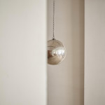 A Victorian glass witch's ball