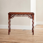 A George III plum pudding mahogany rectangular silver table