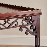 A George III plum pudding mahogany rectangular silver table