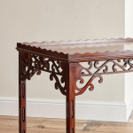 A George III plum pudding mahogany rectangular silver table