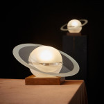 A rare pair of 'Saturne' frosted glass table lamps by Jean Tranchant (1904 - 1972) for Damon