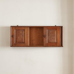 An Arts & Crafts Cotswold School chestnut wall-mounted cabinet possibly by Sir Gordon Russell (1892 - 1980)