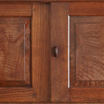 An Arts & Crafts Cotswold School chestnut wall-mounted cabinet possibly by Sir Gordon Russell (1892 - 1980)