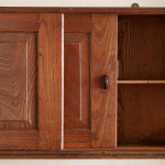 An Arts & Crafts Cotswold School chestnut wall-mounted cabinet possibly by Sir Gordon Russell (1892 - 1980)