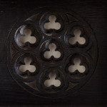 A small Gothic Revival ebonised oak hanging shelf