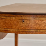 A George III burr oak oval Pembroke table