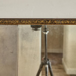 A George III ebonised and parcel gilt triple-plate overmantle mirror