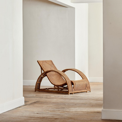 A large wicker lounge chair