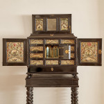 An exceptional ebony veneered and silk stumpwork Antwerp cabinet on stand