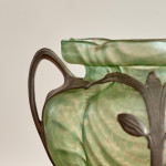 An Art Nouveau iridescent glass and pewter mounted vase, the pewter by Friedrich van Houten & Sohn and the glass attributed to Wilhelm Kralik & Sohn