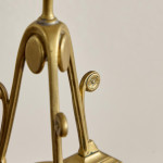 A pair of Aesthetic Movement brass candlesticks