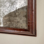 A William & Mary walnut crested cushion mirror