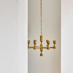A near pair of small six branch gilt brass chandeliers by Gusum Metallslöjden AB