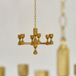 A near pair of small six branch gilt brass chandeliers by Gusum Metallslöjden AB