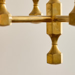 A near pair of small six branch gilt brass chandeliers by Gusum Metallslöjden AB