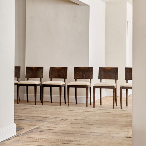 A set of six Modernist stained and limed oak dining chairs attributed to Suzanne Guiguichon (1901 - 1985)