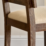 A set of six Modernist stained and limed oak dining chairs attributed to Suzanne Guiguichon (1901 - 1985)