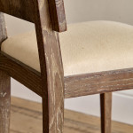 A set of six Modernist stained and limed oak dining chairs attributed to Suzanne Guiguichon (1901 - 1985)