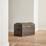 A black leather studded domed trunk