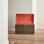 A black leather studded domed trunk