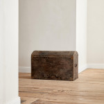 A black leather studded domed trunk