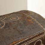 A black leather studded domed trunk