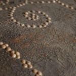 A black leather studded domed trunk