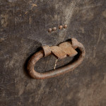 A black leather studded domed trunk