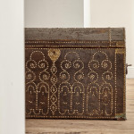 A black leather studded domed trunk