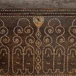 A black leather studded domed trunk