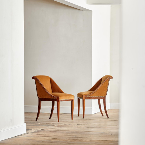 A pair of Art Deco rosewod veneered slipper chairs
