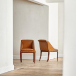 A pair of Art Deco rosewod veneered slipper chairs