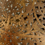 A large brass shadow ball pendant