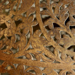 A large brass shadow ball pendant