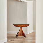 An unusual William IV satinwood veneered folding card table