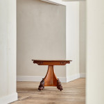 An unusual William IV satinwood veneered folding card table