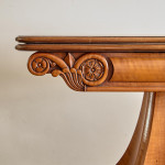 An unusual William IV satinwood veneered folding card table