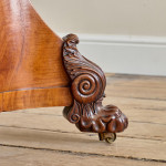 An unusual William IV satinwood veneered folding card table