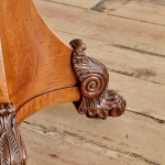 An unusual William IV satinwood veneered folding card table