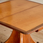 An unusual William IV satinwood veneered folding card table