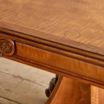 An unusual William IV satinwood veneered folding card table