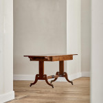 A Regency brown oak sofa table