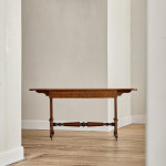 A Regency brown oak sofa table
