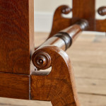 A Regency brown oak sofa table
