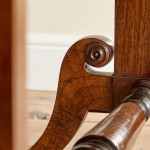 A Regency brown oak sofa table