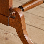 A Regency brown oak sofa table
