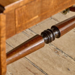 A Regency brown oak sofa table