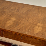 A Regency brown oak sofa table