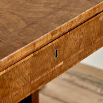 A Regency brown oak sofa table