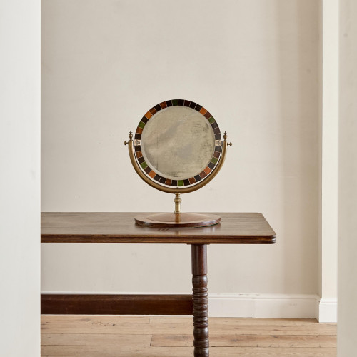 An unusual and large Victorian circular dressing mirror